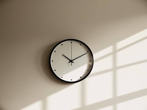 an image of a clock on the wall of a busy classroom